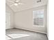 Bright bedroom with grey walls and carpet flooring at 6684 Crane Ave, Fairburn, GA 30213