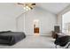 Main bedroom with vaulted ceiling and en-suite bathroom at 6684 Crane Ave, Fairburn, GA 30213