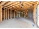 Unfinished basement area with framing and electrical at 9165 Golfview Ln, Covington, GA 30014