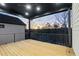 Spacious deck offering sunset views and a ceiling fan at 9165 Golfview Ln, Covington, GA 30014