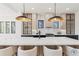 Modern kitchen with white countertops and wood cabinets at 9165 Golfview Ln, Covington, GA 30014