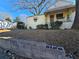 Front view of a yellow house with a porch and yard at 1140 Ira Sw St, Atlanta, GA 30310