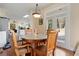 Cozy breakfast nook with bright, natural light and door leading to the backyard at 3130 Caney Creek Ln, Cumming, GA 30041