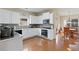 Modern kitchen featuring stainless steel appliances, sleek countertops, and ample cabinet space at 3130 Caney Creek Ln, Cumming, GA 30041