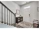 Inviting entryway with staircase, storage, and decorative rug at 3346 Long Creek Dr, Buford, GA 30519