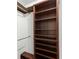 Walk-in closet with shelving and hanging rods at 730 Lake Forest Pass, Roswell, GA 30076