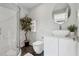 Modern bathroom with stylish vessel sink, round mirror, and glass-enclosed shower stall at 75 Boulevard Ne # 1, Atlanta, GA 30312