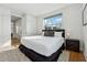 Modern bedroom features a comfortable bed, large window, and ample closet space at 75 Boulevard Ne # 1, Atlanta, GA 30312