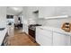 Modern kitchen with white cabinets, quartz countertops, and stainless steel appliances at 75 Boulevard Ne # 1, Atlanta, GA 30312