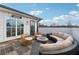 Outdoor patio featuring a fire pit, comfortable seating, and a view of the city skyline at 75 Boulevard Ne # 1, Atlanta, GA 30312