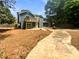Expansive backyard features a multi-level deck and concrete patio, perfect for outdoor enjoyment at 2781 Interlaken Dr, Marietta, GA 30062