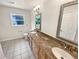 Bathroom features double sinks, granite countertops, and decorative mirrors, creating a luxurious feel at 2781 Interlaken Dr, Marietta, GA 30062