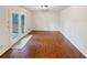Bright dining room with hardwood floors and french doors to backyard at 2781 Interlaken Dr, Marietta, GA 30062