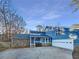 Stunning blue house with stone accents and a two-car garage at 2781 Interlaken Dr, Marietta, GA 30062