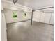Clean, bright garage with painted floor offers a functional space for parking and storage with natural light at 2781 Interlaken Dr, Marietta, GA 30062