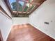 Bright living room features hardwood floors, skylights, and a ceiling fan, offering a unique and inviting space at 2781 Interlaken Dr, Marietta, GA 30062