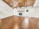 Inviting living room featuring a stone fireplace, wood ceiling, and hardwood flooring at 2781 Interlaken Dr, Marietta, GA 30062