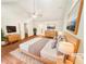 Bright main bedroom features hardwood floors, vaulted ceiling, and ensuite bathroom at 2781 Interlaken Dr, Marietta, GA 30062