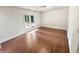 Bright room with hardwood floors and French doors leading to the outdoor area offers versatility at 2781 Interlaken Dr, Marietta, GA 30062