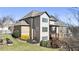 Multi-story home showcasing outdoor decks and a landscaped backyard with tiered retaining wall at 4532 Summersweet Dr, Marietta, GA 30066