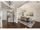 Bright dining room with wood floors, modern chandelier, and staircase in view at 4532 Summersweet Dr, Marietta, GA 30066