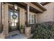 Charming brick home entrance featuring a stylish door with a decorative wreath at 4532 Summersweet Dr, Marietta, GA 30066