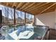 Outdoor deck with a hot tub and wooden ceiling at 4532 Summersweet Dr, Marietta, GA 30066