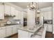 Gourmet kitchen featuring a granite island, stainless appliances, and ample storage at 4532 Summersweet Dr, Marietta, GA 30066