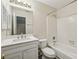 Updated bathroom with a white vanity and bathtub at 1025 Rock Creek Ln, Norcross, GA 30093