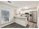 Kitchen with granite countertops and stainless steel appliances at 1025 Rock Creek Ln, Norcross, GA 30093