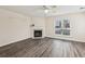 Living room with fireplace and wood-look floors at 1025 Rock Creek Ln, Norcross, GA 30093