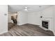 Living room with fireplace and wood-look floors at 1025 Rock Creek Ln, Norcross, GA 30093