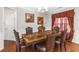 Formal dining room with hardwood floors and a decorative chandelier at 1912 Wheat Valley Cir, Conyers, GA 30013