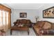 Living room with two sofas and a large coffee table at 1912 Wheat Valley Cir, Conyers, GA 30013