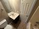 Clean bathroom with vanity, sink and bathtub at 5226 Oaktree Trl, Lithonia, GA 30038