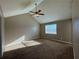 Large bedroom with vaulted ceiling and ceiling fan at 5226 Oaktree Trl, Lithonia, GA 30038