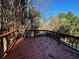 Wooden deck overlooking the backyard and trees at 5226 Oaktree Trl, Lithonia, GA 30038