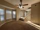 Spacious living room with large windows and neutral carpeting at 5226 Oaktree Trl, Lithonia, GA 30038