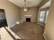 Bright living room featuring a fireplace and bay window at 5226 Oaktree Trl, Lithonia, GA 30038