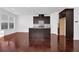 Open concept kitchen with dark cabinets and granite island at , Stone Mountain, GA 30083