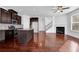 Modern kitchen with dark cabinets, granite island, and stainless steel appliances at , Stone Mountain, GA 30083