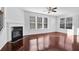 Bright living room with hardwood floors, fireplace, and large windows at , Stone Mountain, GA 30083