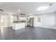 Modern kitchen with island, stainless steel appliances, and dark flooring at 2681 Tilson Rd, Decatur, GA 30032