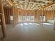 Spacious unfinished basement with large windows at 300 River Birch Ct, Canton, GA 30114