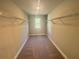 Spacious walk-in closet with ample shelving at 300 River Birch Ct, Canton, GA 30114