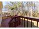 Spacious back deck with wooded views, offering a peaceful retreat at 4723 N Springs Nw Rd, Kennesaw, GA 30144