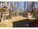 Serene backyard with treehouse and storage shed at 4723 N Springs Nw Rd, Kennesaw, GA 30144