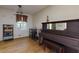 Dining area with hardwood floors, piano, and shelving unit at 4723 N Springs Nw Rd, Kennesaw, GA 30144