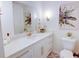 Modern bathroom with white vanity, gold accents, and patterned floor at 1080 Willow Bnd, Roswell, GA 30075