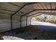 Interior view of carport showing gravel floor at 1080 Willow Bnd, Roswell, GA 30075